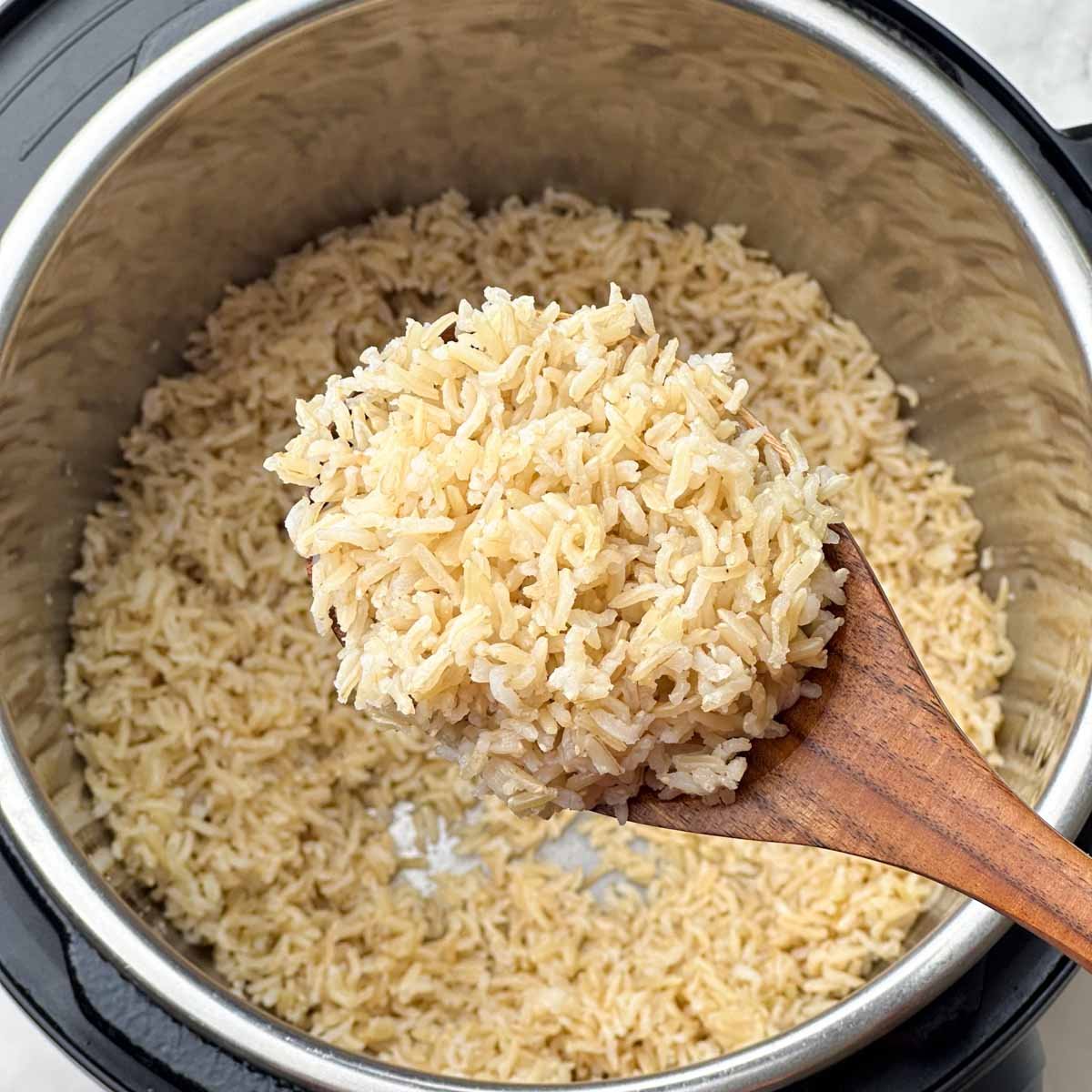 brown basmati rice in a laddle