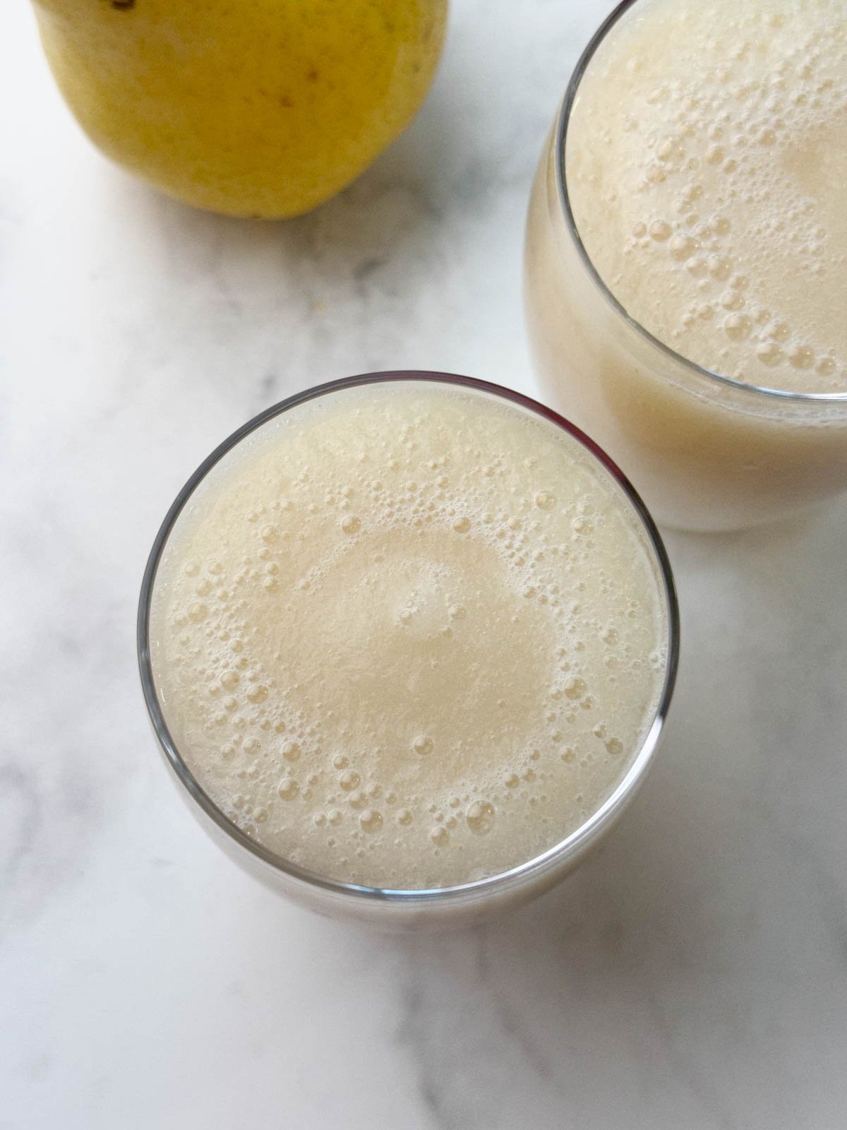 fresh fruit juice served in glasses