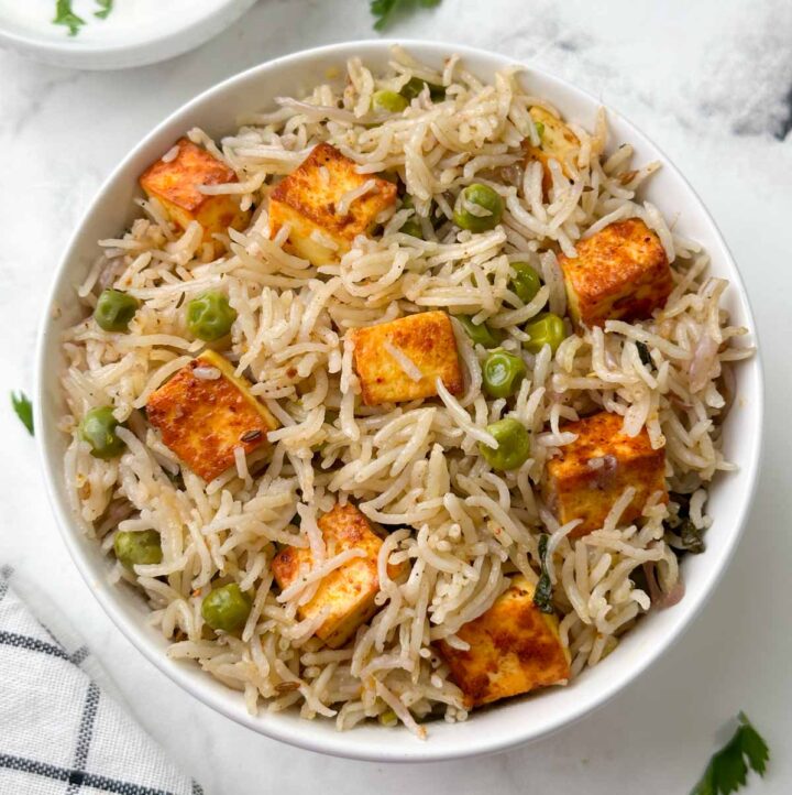 paneer peas pulao in a serving bowl