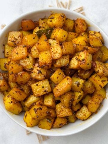 south indian potato fry served in a bowl