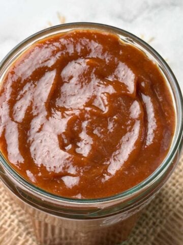 sweet tamarind date chutney in a glass jar