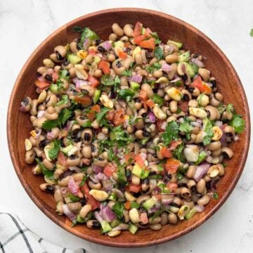 black eyed peas salad (lobia chaat) served in a wooden bowl.