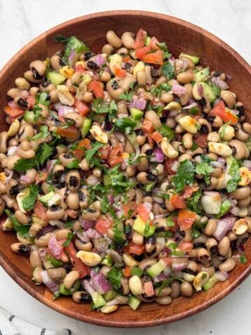 black eyed peas salad (lobia chaat) served in a wooden bowl.