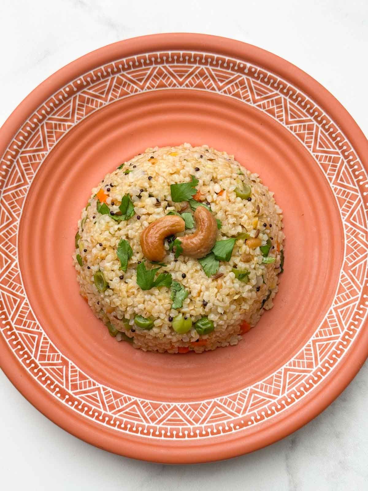 dalia upma served in a plate
