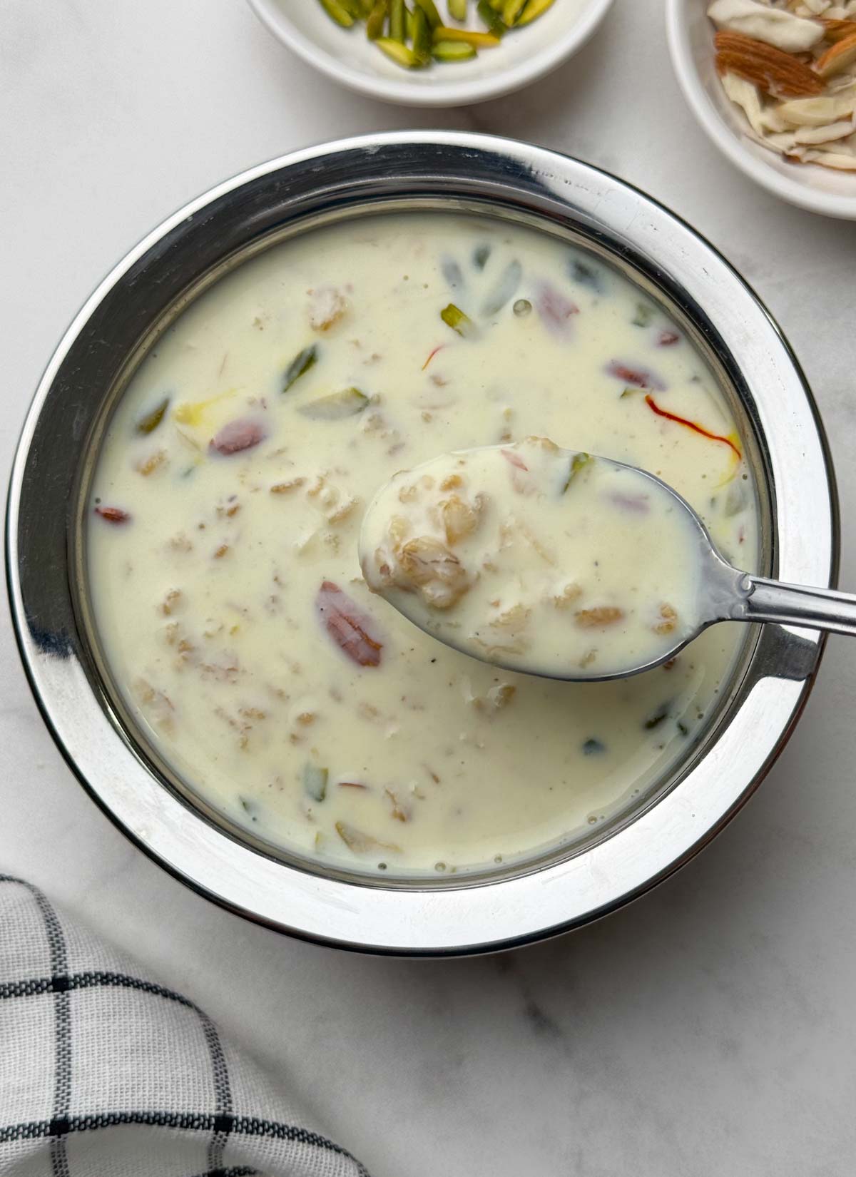 rolled oats payasam in a spoon