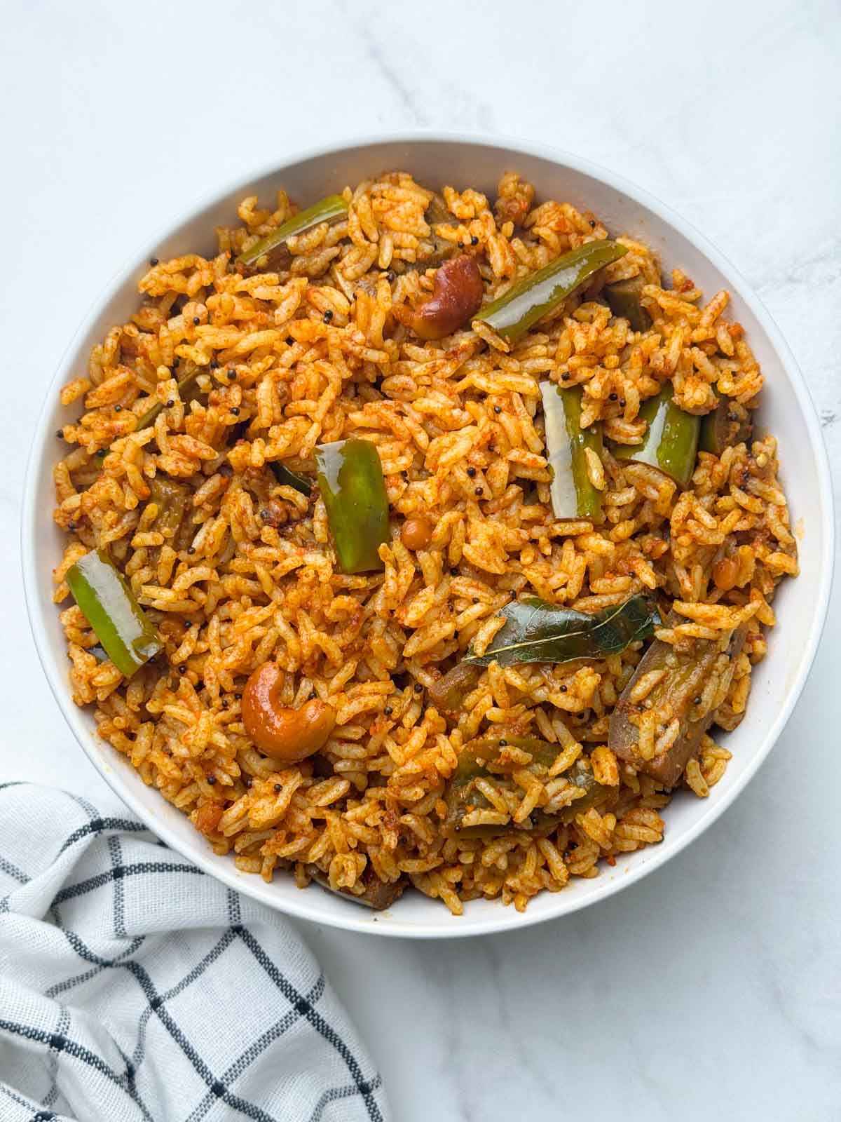 vangi bhath rice served in a bowl