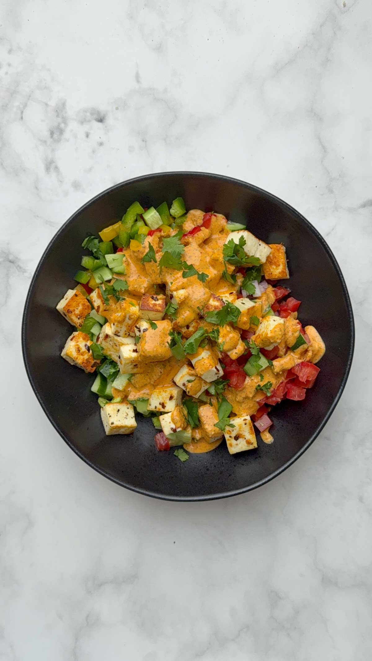 Step to add greek yogurt dressing and the coriander leaves.