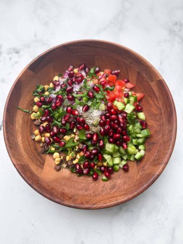 chana salad ingredients in the wooden bowl.