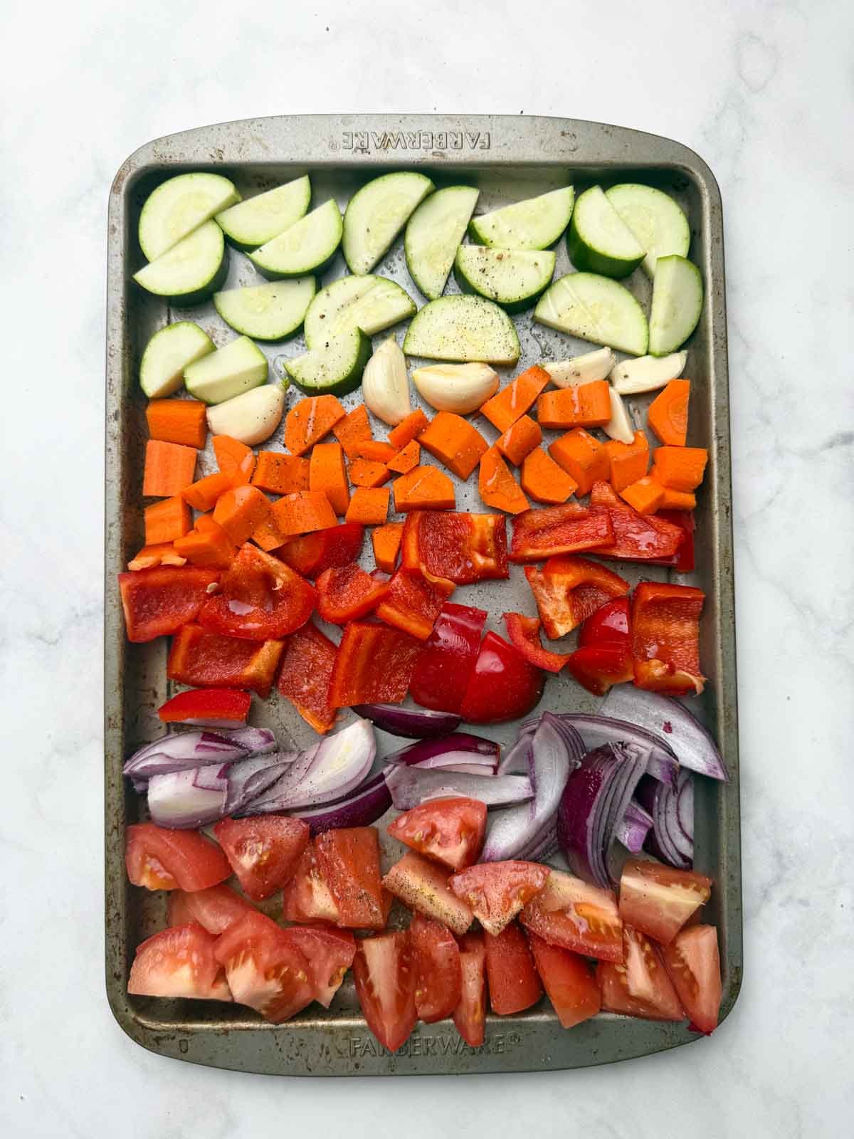 Step to layer all the veggies on the baking tray.